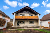Hausansicht - Großzügiges Einfamilienhaus mit tollem Grundstück und viel Gestaltungspotenzial