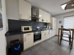 Küche Einliegerwohnung - Möbliertes Haus mit Einliegerwohnung
