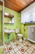 Badezimmer - Wohnen auf einer Ebene – großzügiger Bungalow mit ertragsstarker PV-Anlage