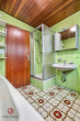 Badezimmer - Wohnen auf einer Ebene – großzügiger Bungalow mit ertragsstarker PV-Anlage