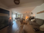 Wohnzimmer - Attraktive Wohnung mit großzügigem Wohnbereich und moderner Ausstattung