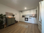 Küche - Attraktive Wohnung mit großzügigem Wohnbereich und moderner Ausstattung