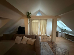 Wohnzimmer - Gemütliche Dachgeschosswohnung mit offenem Wohnbereich